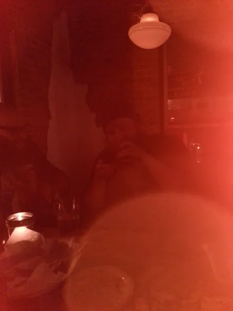 Chris, busy on his phone.