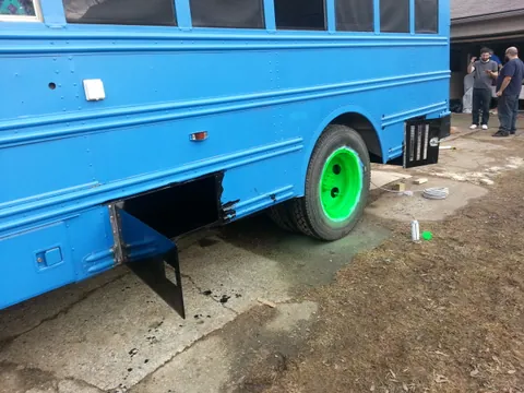 First coat of POR-15 on the doors and rear wheel ninja turtled up.
