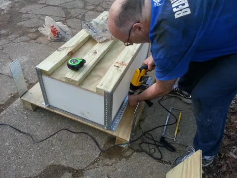 My pops screwing in the rails.