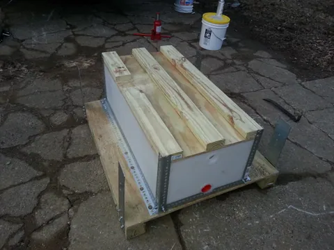 We had to take a notch out for a bracket that is on the bus. Those 2×4’s on the top are not ‘structural’… they’re acting as spacers primarily.
