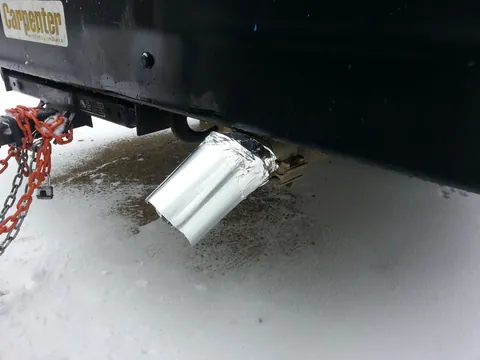 Close up of ghetto down-turn pipe for exhaust