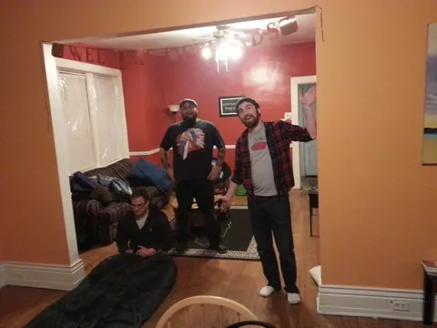Dave blowing up the air mattress for Snake to sleep on