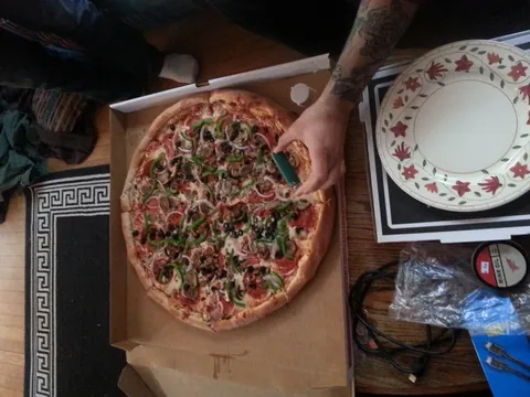 Pizza so big you slap the person to your left