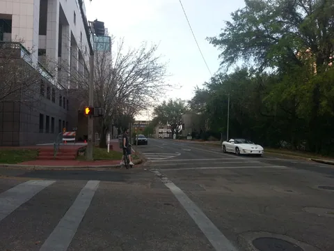 Biking back from the tattoo shop near the courthouse