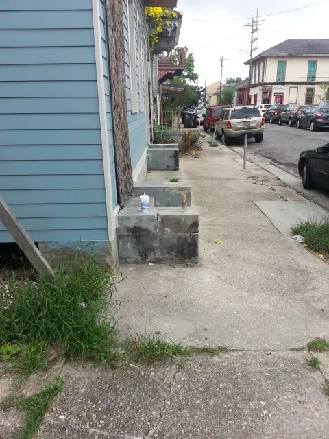 This epitomizes NOLA. Not smashed or anything, someone was just out drinking and finished up and set it down.