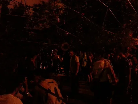 A punk house where they have shows and overcharge you for cheap beers.